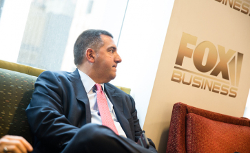 Relaxing while watching the news at New York City's Fox Business Network.