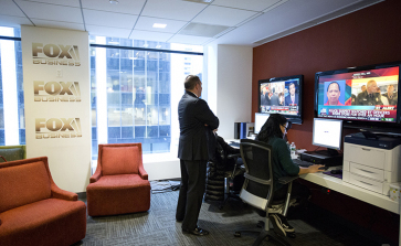 Taking a few minutes to catch up on some Fox Business news while in the After the Bell green room.